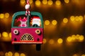 Wooden Christmas decoration on a background of bokeh lights garland Royalty Free Stock Photo