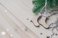 Wooden Christmas decorations - Christmas socks on a white wooden background with a Christmas tree Royalty Free Stock Photo