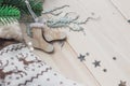Wooden Christmas decorations - Christmas socks on a white wooden background with a Christmas tree Royalty Free Stock Photo