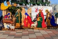 Wooden Christmas Nativity scene with Holy family in city park Royalty Free Stock Photo