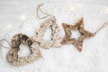 Wooden Christmas Ornaments in the Snow Royalty Free Stock Photo