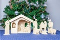 Wooden christmas stable with religious bible figurines