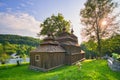 Wooden church of Saint Michael the Archangel in Prikra during summer sunset Royalty Free Stock Photo