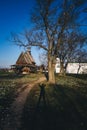 Wooden church and shadow of a person Royalty Free Stock Photo