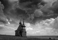 Wooden church on the top of the hill. Vershinino village sunset view. Arkhangelsk region, Northern Russia. Royalty Free Stock Photo