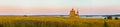 Wooden church on the top of the hill. Vershinino village sunset view. Arkhangelsk region, Northern Russia. Royalty Free Stock Photo