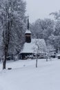 Church in the Village Museum during a snowy winter Royalty Free Stock Photo