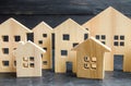 Wooden city and houses. concept of rising prices for housing or rent. Growing demand for housing and real estate. Royalty Free Stock Photo