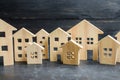 Wooden city and houses. concept of rising prices for housing or rent. Growing demand for housing and real estate. Royalty Free Stock Photo