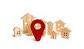 Wooden city and houses location sign. concept of rising prices