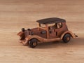 A wooden classic toy car