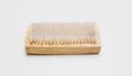 Wooden cleaning brush with nylon bristle isolated cutout on white background. Overhead view