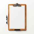 wooden clipboard with blank paper and a pen, isolated on a white background Royalty Free Stock Photo