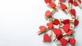 Wooden clips with red heart. White background with copy space Royalty Free Stock Photo