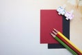 Wooden clips, sticky notes and color pencils Royalty Free Stock Photo