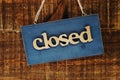 Wooden Closed sign with space copy on wooden background Royalty Free Stock Photo