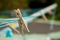 Wooden clothes peg on a washing line Royalty Free Stock Photo