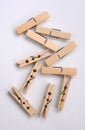 Wooden clothes pin. Closeup pin set on white background Royalty Free Stock Photo