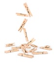 Wooden clothespin falling isolated Royalty Free Stock Photo