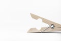 Wooden clothespin on a white background. clamp Royalty Free Stock Photo