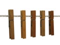 Wooden clothespins on a clothes line (+ clipping path) Royalty Free Stock Photo