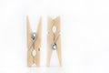 Wooden clothespins isolate on white background