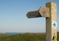 Wooden coast path sign post