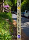 A wooden coastal path sign public footpath and cycleway, Dartmouth, Devon, United Kingdom, May 23, 2018 Royalty Free Stock Photo