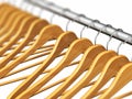 Wooden coat hangers on clothes rail