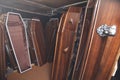 Wooden coffins in the dark room