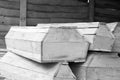 Wooden coffins of various sizes / black and white photo