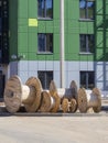 Wooden coil for electric cable on an industrial construction site Royalty Free Stock Photo