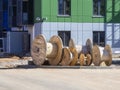 Wooden coil for electric cable on an industrial construction site Royalty Free Stock Photo