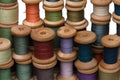 Wooden coil with sewing thread