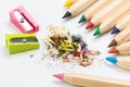 Wooden colorful pencils isolated on a white background, pencil sharpeners Royalty Free Stock Photo