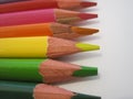 Wooden coloring pencil crayons on a white