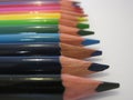 Wooden coloring pencil crayons on a white background