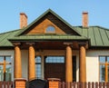 Wooden Columns of the Porch Entrance to the House Royalty Free Stock Photo