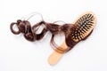 Wooden comb brush with hair Royalty Free Stock Photo