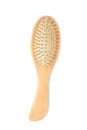 Wooden comb brush isolated on white background, clipping path Royalty Free Stock Photo