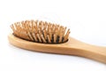 Wooden comb brush with lost hair Royalty Free Stock Photo