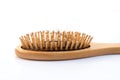 Wooden comb brush with lost hair Royalty Free Stock Photo