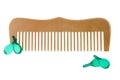 Wooden comb with capsules of Hair vitamin serum isolated on whi