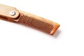 Wooden comb made of natural sandalwood for men on a white background
