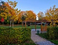 wooden construction of the bus stop, shelter of a gazebo pergola. Royalty Free Stock Photo