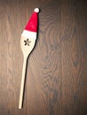 Wooden cooking spoon with hat of Santa Royalty Free Stock Photo
