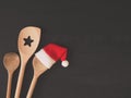 Wooden cooking spoon with hat of Santa Royalty Free Stock Photo