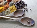 Wooden cooking spoons and set of spices Royalty Free Stock Photo