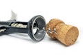 Vintage wooden corkscrew bottle opener and red wine cork Royalty Free Stock Photo