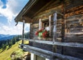 Wooden cottage in the Alps mountains